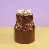 2 Tier Cake - Design Your Own with rich chocolate layers, decorated with meringue and edible gold accents by Crumbs & Doilies